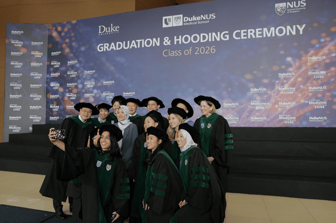 Mdm Rahayu Mahzam with graduates from the Duke-NUS Medical School Class of 2026 and leaders  from Duke-NUS, Duke University, NUS and SingHealth